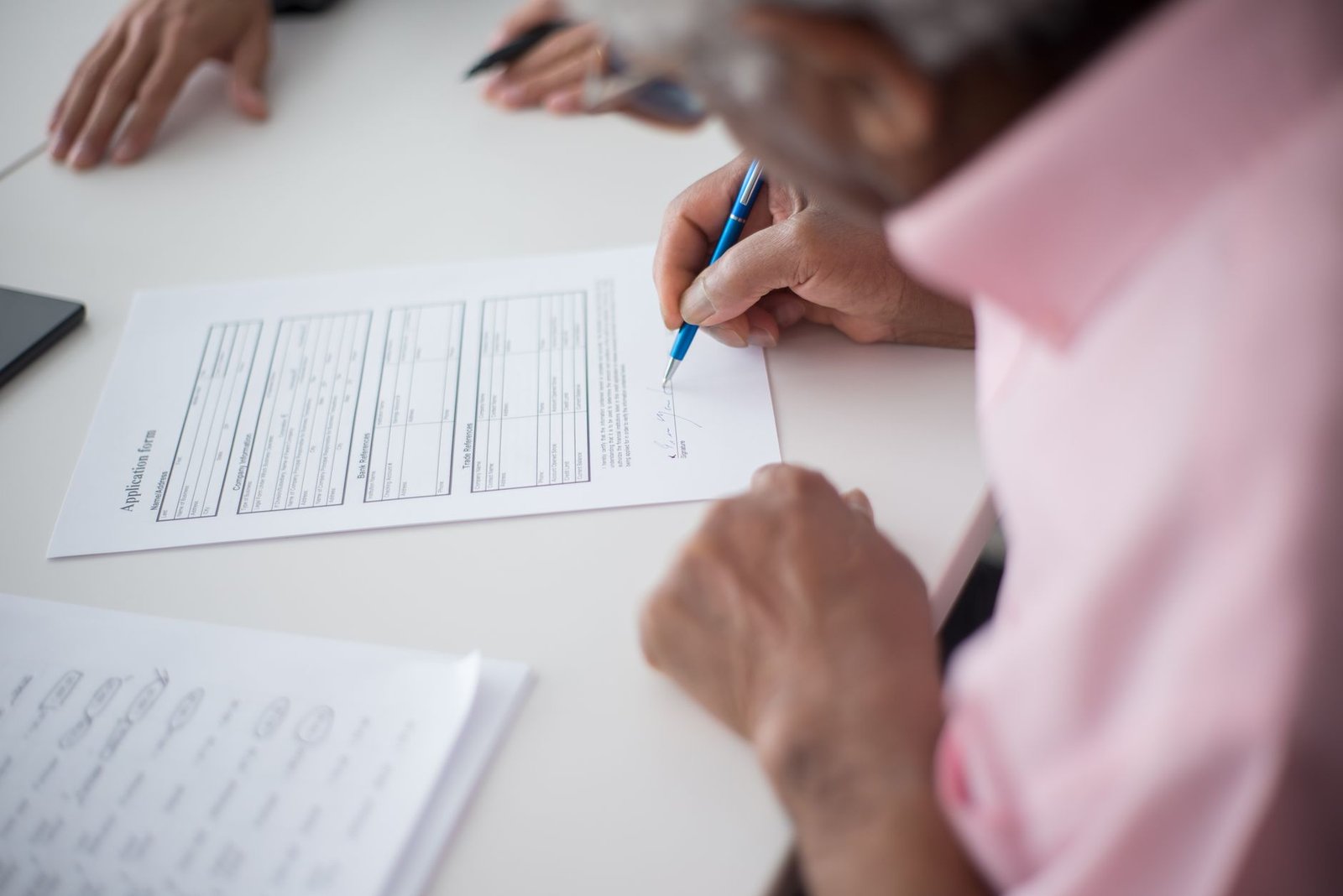 Former aircraft mechanic completing VA paperwork about occupational asbestos exposure during service